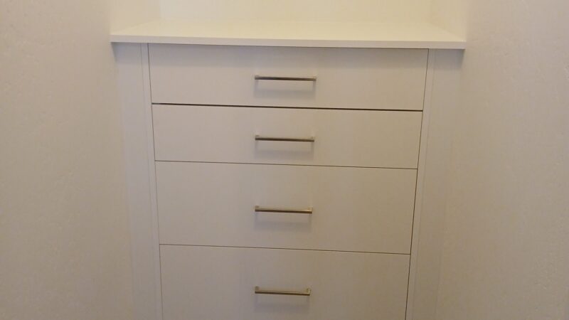 Custom Storage Solutions Murtaugh Closet suitcase storage